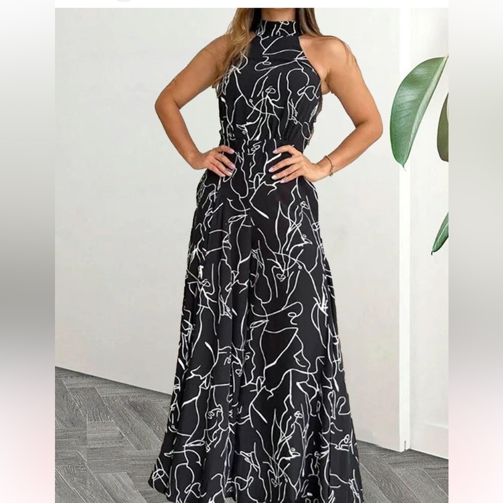 Black jumpsuit with design in white